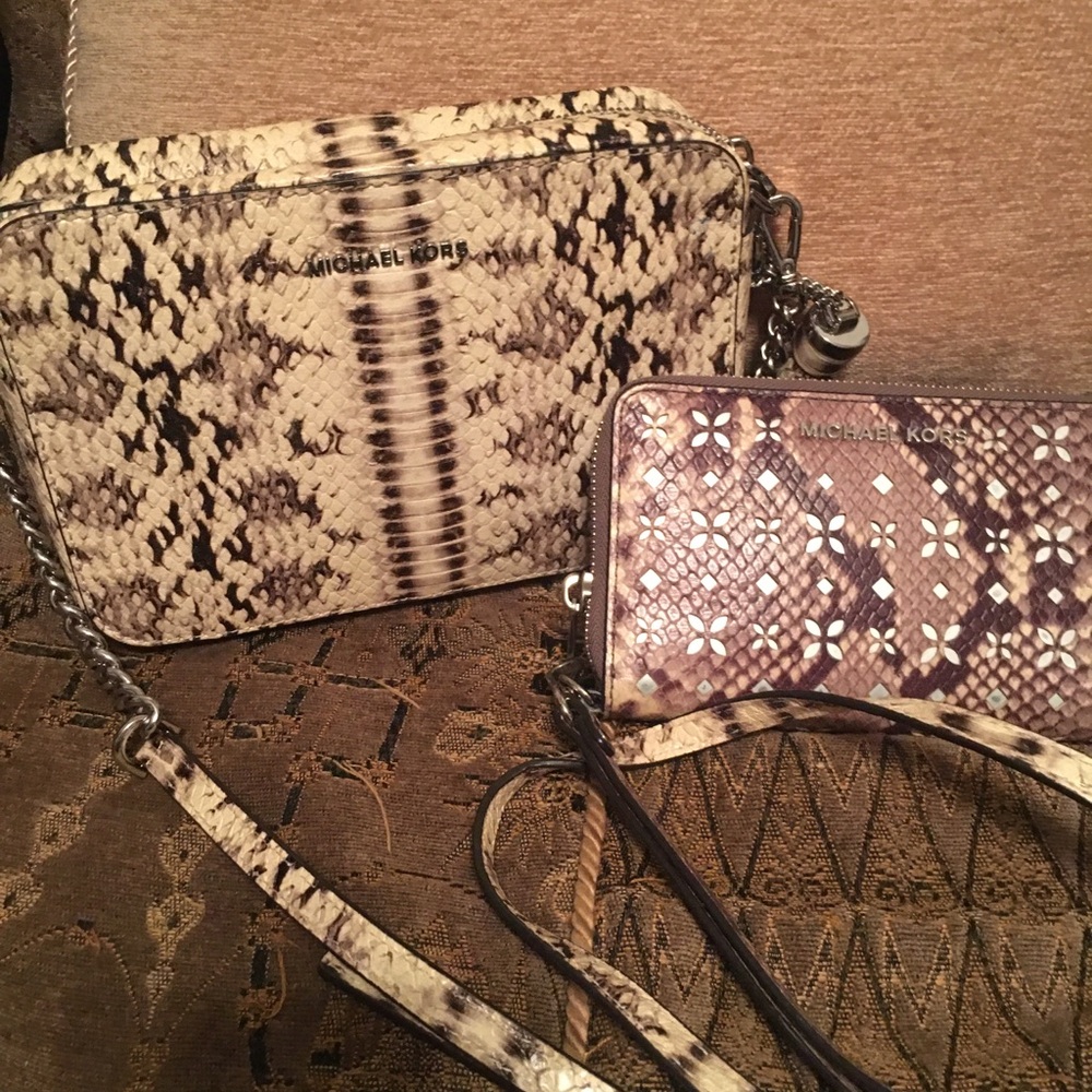 Michael Kors handbag with matching wallet snake pattern in excellent condition.